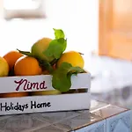 Nima Holidays קאנטו